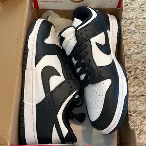 White and black low dunks Nike